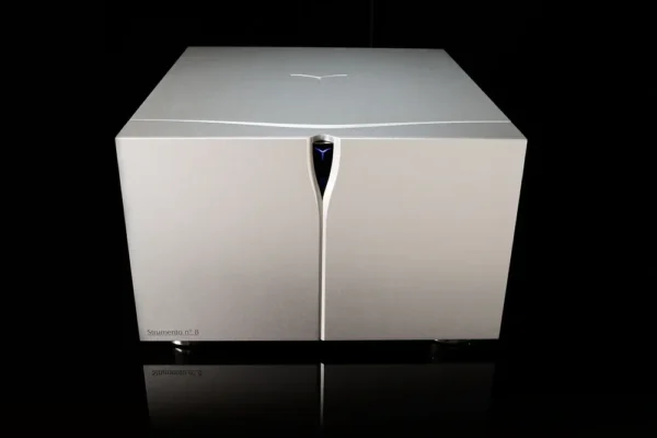 A white box with two doors on top of it.