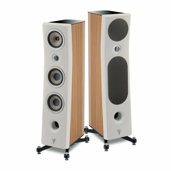 A pair of speakers with white wood panels.