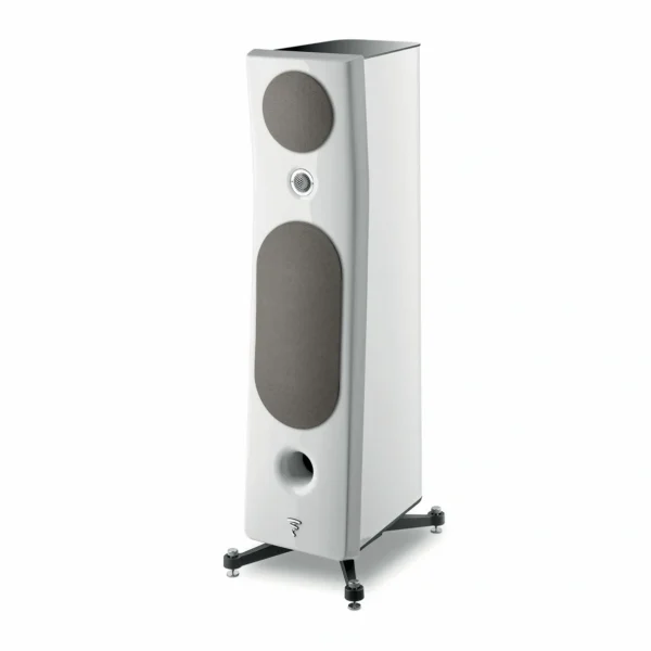 A white speaker stands on the floor.