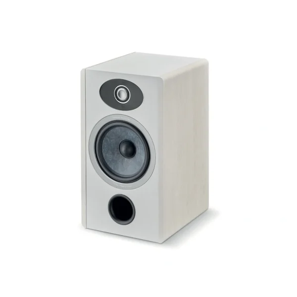 A white speaker sitting on top of a floor.