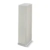 A white speaker tower with no speakers on top.