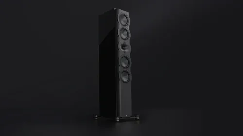 A black speaker tower with speakers on top of it.