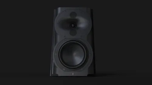 A black speaker is in the dark and there are no speakers.