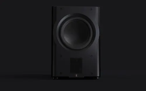 A black speaker is in the dark.