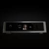 Modern audio receiver displaying music information.