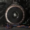 Electronic components and wiring on black background.